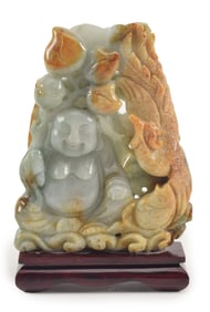 Jade carving. China. 20th century. Buddha with a phoenix. 4in.