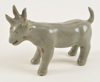 Very rare Lung Chuan sculpture of a triceratops. China. Sung period (960-1279). 4 x 3.25in.