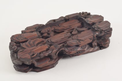 Finely carved rosewood stand. China. 18th/19th century. Surface carved with lotuses and ling chih.