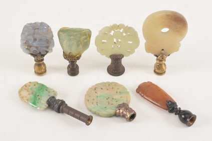 Lot of 7 lamp finials. China. 19th century with later mounts. 6 jade and one agate. Each about 2in
