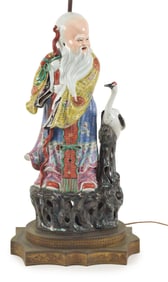 Porcelain figure of Shao Lao. China. Mid 20th century. Mounted as a lamp. 19in.