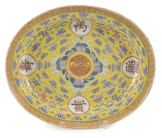Porcelain platter. China. 19th/early 20th century. Yellow ground with auspicious characters. 15.5 x