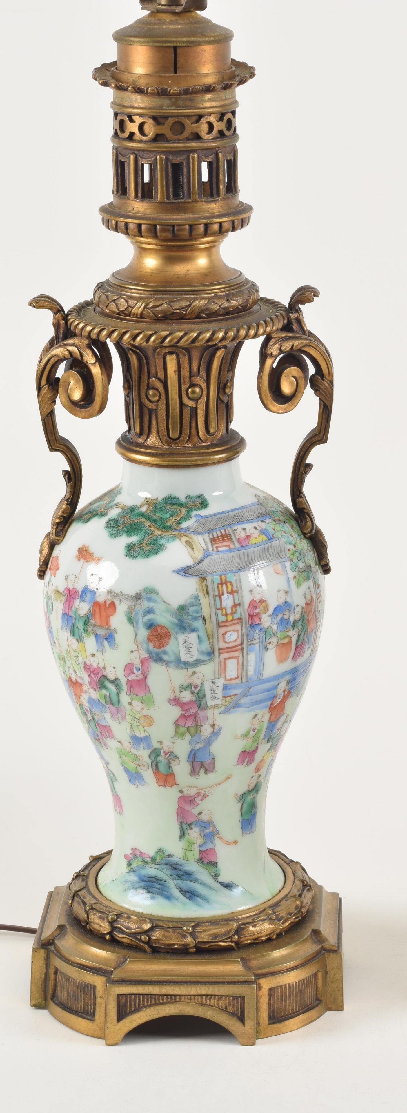 Porcelain vase. China. 19th century. Decoration of the hundred children. Drilled and mounted as a (1 of 6)