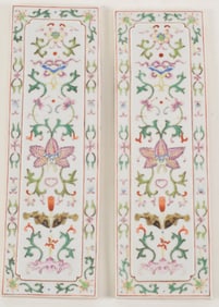 Pair of porcelain plaques. China. 19th century. Famille rose decoration of buddhist emblems. 9.75 x