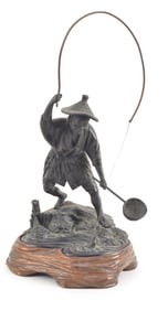 Bronze sculpture. Japan. Early 20th century. Okimono of a fisherman. Carved fitted wooden base. 16in