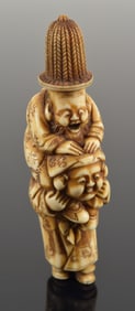 Carved toggle. Japan. 19th century. Netsuke of Ebisu and Jurojin. Signed Gyokumin. 3in.