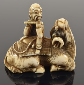 Netsuke. Japan. 19th century. Lao Tzu on the back of a ram. Signed. 2in. 1958 bill of sale.