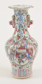 Porcelain vase. China. Mid 19th century. Famille rose historical scenes on a flowered ground. shaped