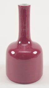 Porcelain vase. China. 19th century. Mallet shaped. Magenta monochrome glaze. 7in.