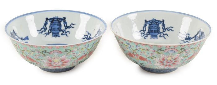 Pair of porcelain bowls. China. Early 20th century. Dao Guang mark. Underglaze blue interiors,