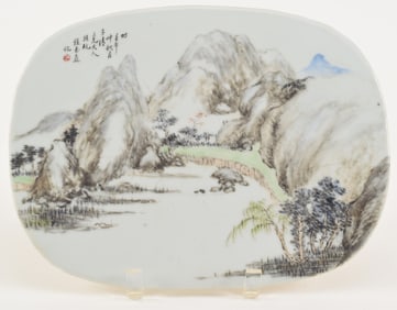 Porcelain plaque. China. Early 20th century. Oval form. Landscape decoration. 11.5 x 8.5in.
