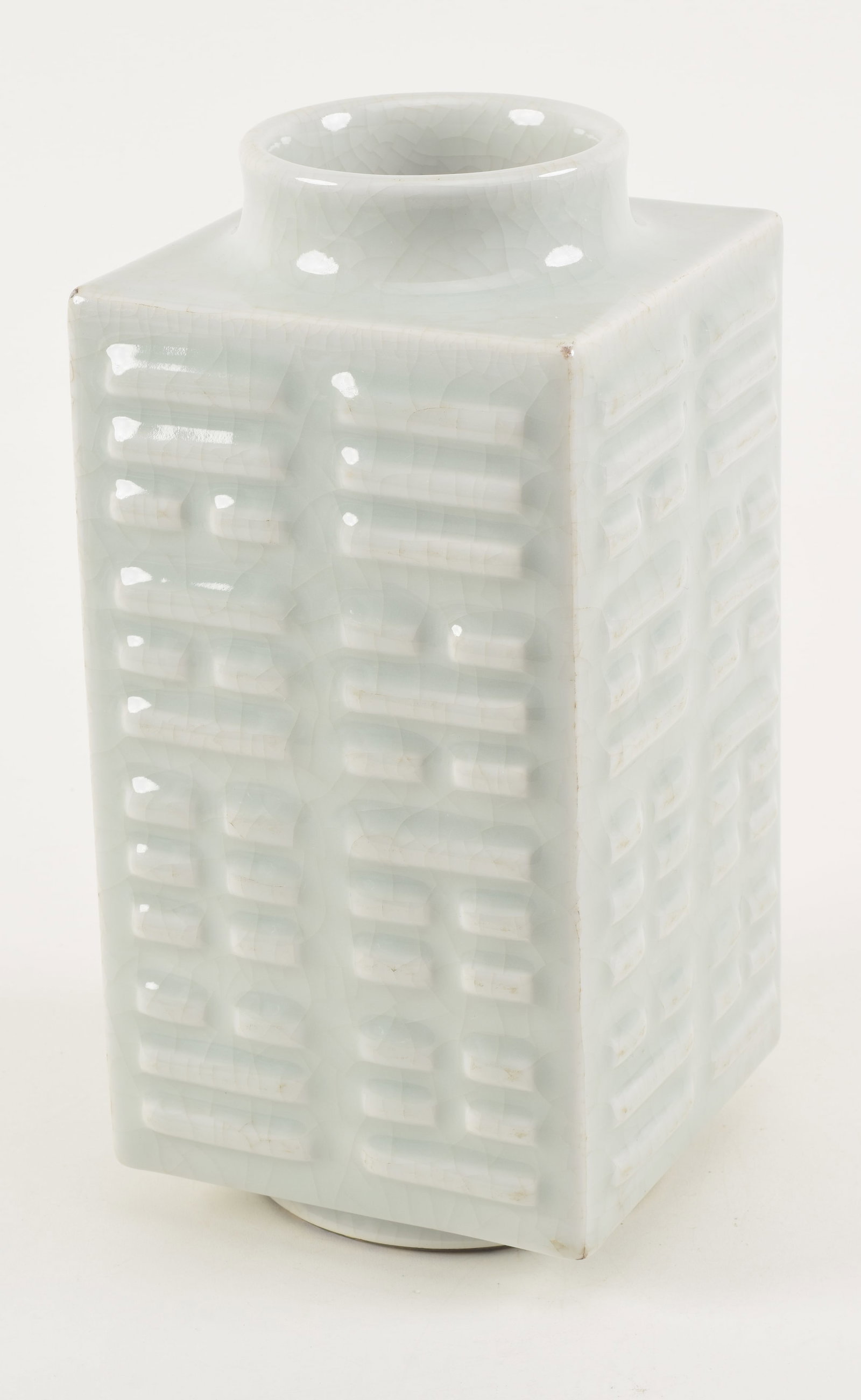 Porcelain vase. China. Kuang Hsu mark (1875-1908) and period. Tsung form decorated with the Ba Kua: Porcelain vase. China. Kuang Hsu mark (1875-1908) and period. Tsung form decorated with the Ba Kua trigrams. Pale celadon glaze. 11in high. Wear to glaze at corners.