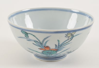 Porcelain bowl. China. Early 18th century. Tou tsai ware. Decoration of mandarin ducks and lotus
