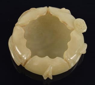 Jade water coupe. China. 19th century. Carved in the form of an open blossom. 2.25in.