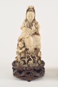 Carved image of the goddess of mercy Kuan Yin. China. Chien Lung period (1735-1796). Wave carved