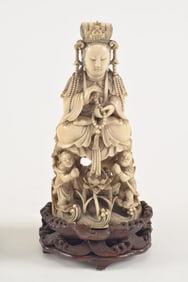 Carved image of the goddess of mercy Kuan Yin with rosary. China. Chien Lung period (1735-1796).
