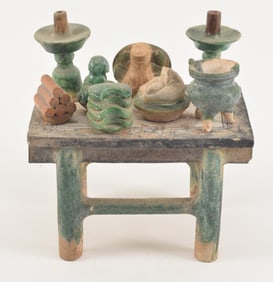 Tomb figure. China. Ming period (1368-1644). Offering table with offerings. San Tsai glaze with