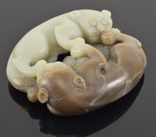 Jade carving. China. 20th century. Pair of tigers. 4 x 3.25in.