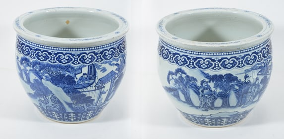 Pair of Chinese porcelain fish bowls with underglaze blue decoration of figures in landscapes.