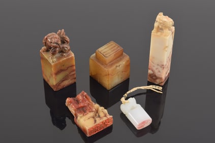 Lot of 5 seals. China. Early 20th century. One jadeite, others soapstone. Seals intact. 3.5in.