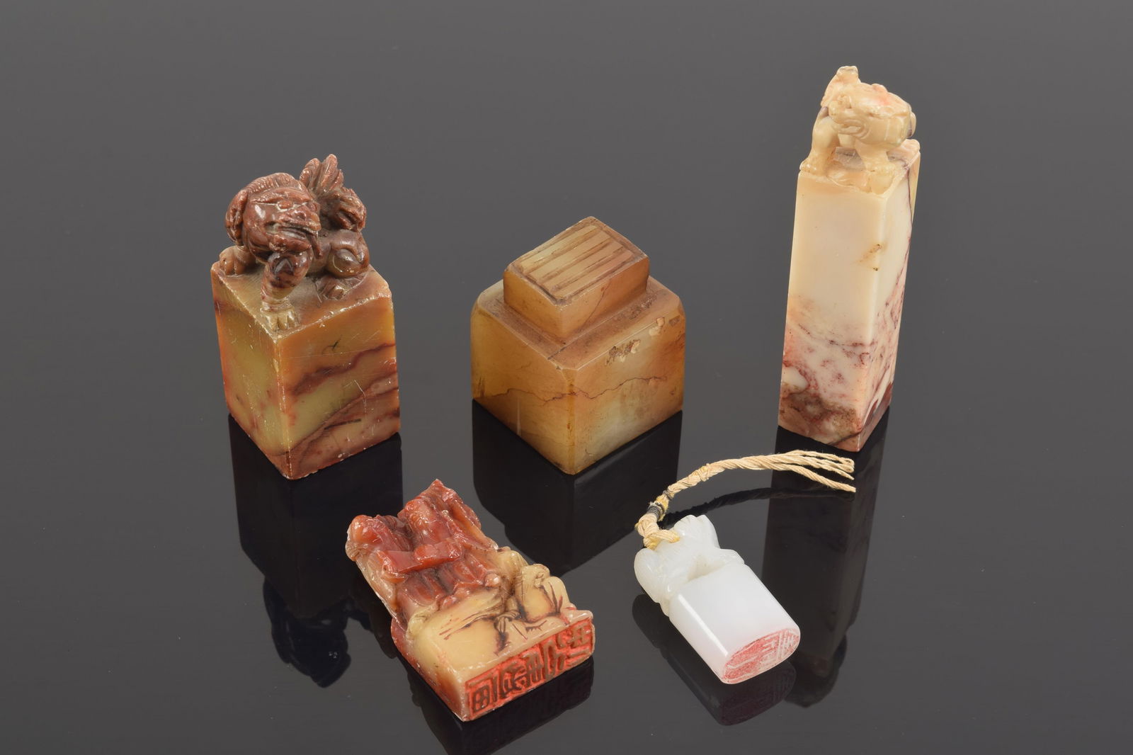 Lot of 5 seals. China. Early 20th century. One jadeite, others soapstone. Seals intact. 3.5in.: Lot of 5 seals. China. Early 20th century. One jadeite, others soapstone. Seals intact. 3.5in.