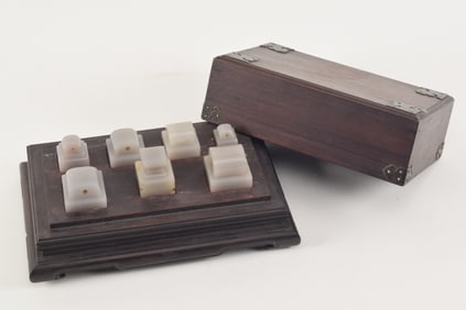 Lot of 7 Chinese grey jade seals, impressions intact. Each about 2in. Boxed.