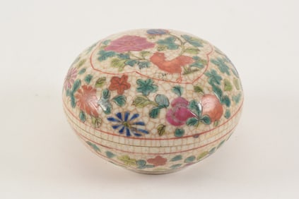 Seal paste box. China. 19th century. floral enamel decoration of flowers on oatmeal crackled ground.