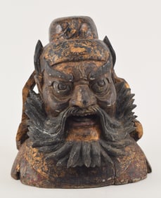 Carved wooden head. China. 18th/19th century. Image of Kuan Ti. Surface lacquered in red and gold