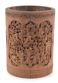 Carved bamboo brush pot. China. 19th century. Canton style carving of figures in a palace setting.