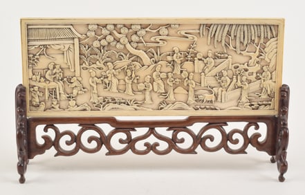 Ink screen. China. 19th century. Rectangular plaque carved with figures in a landscape. Hard wood