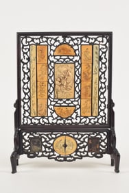 Ink screen. China. 19th century. Carved and engraved plaques inset in a carved and pierced rosewood