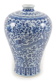 Porcelain vase. China. 20th century. Mei ping form. Underglaze blue decoration of dragons and floral