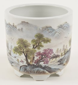 Chinese porcelain footed planter with landscape scene, together with a carved wood brush holder.
