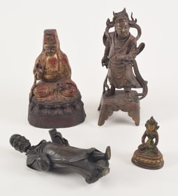 Lot of 4 bronze buddhas. China. 17th/18th century. Largest 8in.