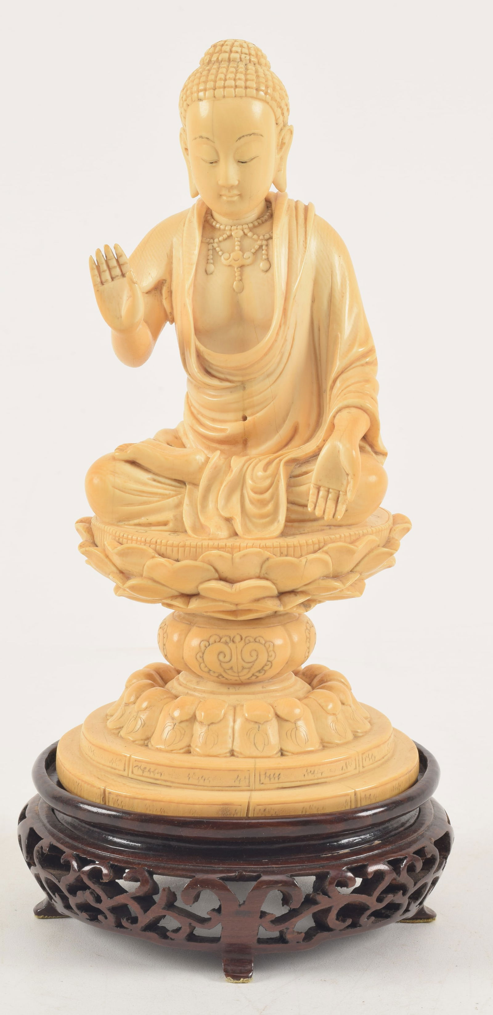 Carved image of the buddha. China. 19th century. Figure of Amida seated on a lotus throne. 8.5in (1 of 5)