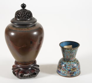 Two cloisonne works. A Japanese cloisonne on porcelain jar with cover and stand together with a