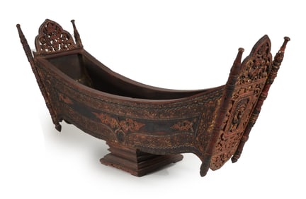 Xylophone cradle. Thailand. 19th century. Carved wood with red and black lacquered surface and gilt.