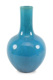 Stoneware vase. Japan. Early 20th century. Bottle shaped. Dark turquoise glaze. 15in high.
