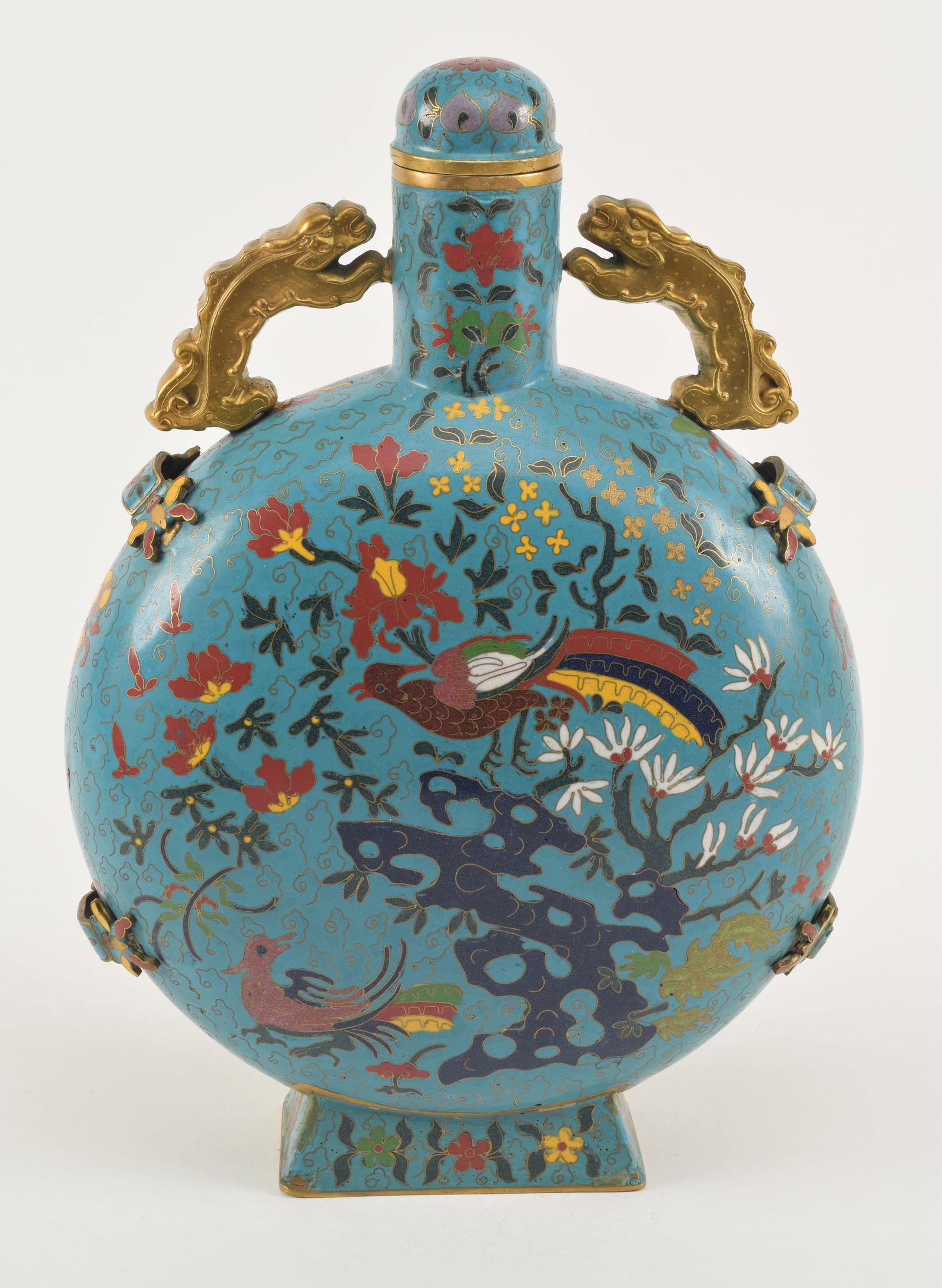 Cloisonne pilgrim flask. China. 20th century. Decoration of the palace of the King on a dark: Cloisonne pilgrim flask. China. 20th century. Decoration of the palace of the King on a dark turquoise ground. 16 x 10.5in.