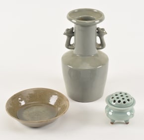 3 celadons. To include: a Kinuta phoenix handled Lung Chuan vase, a yueh bowl, and a small censer.