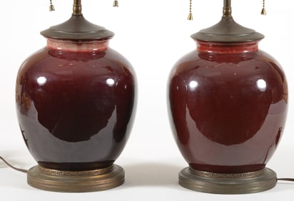 Pair of oxblood vases. China. 19th/20th century. Mounted as lamps.