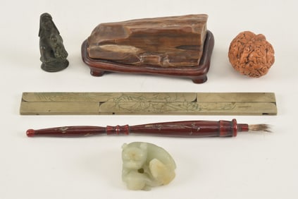 Lot of 6 items. To include: a paktong square, bronze kuan yin, carved walnut shell, brush, jade dog,