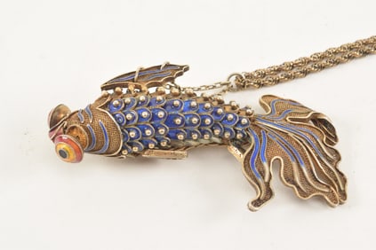 Pendant and necklace. China. Early 20th century. Enameled silver articulated goldfish and chain.
