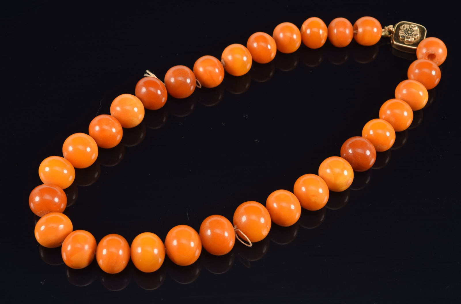Set of butterscotch amber beads. Each about 0.25in. (1 of 3)