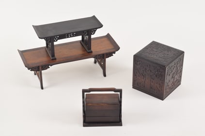 Four wood works. China. 20th century. To include: a seal paste box with a carved chih lung and a