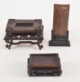 Lot of 3 wooden items. China. 19th century. 2 stands and a carved bamboo wrist rest, mounted. 8.5in
