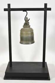 Burmese bronze bell on stand. 20th century.