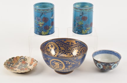 5 ceramics. Japan. 19th century. To include: a foliate blue satsuma saucer, a gilt blue bowl, pair