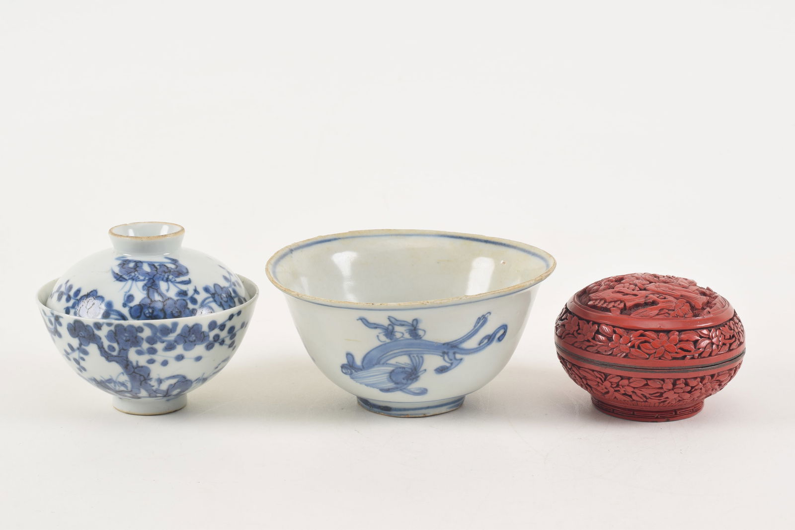 Lot of 3 items. China. 19th/20th century. To include round cinnabar covered box, covered cup, and bo (1 of 6)