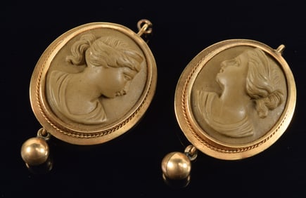 Antique pair of 14K gold carved lava stone cameo earrings. Each signed with initials on the reverse,